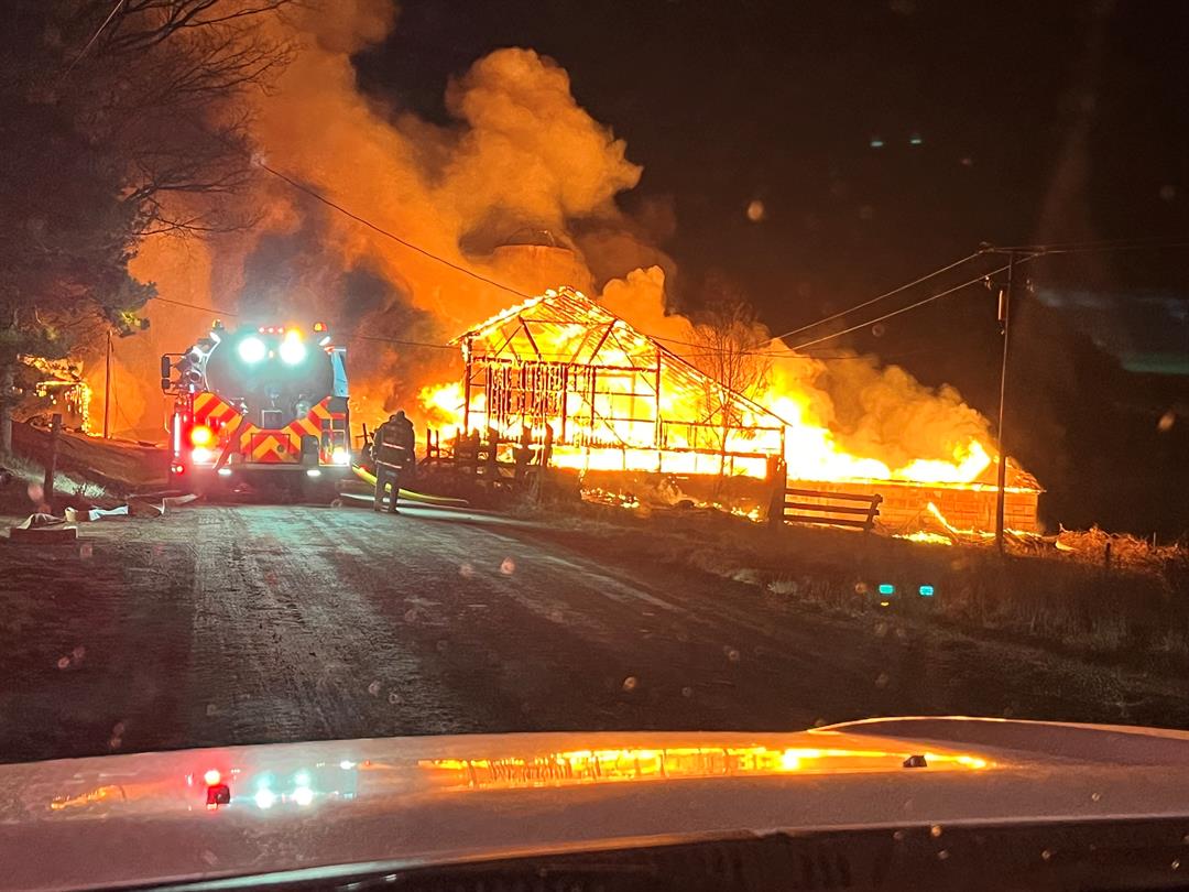 Woman hospitalized after fire destroys 3 barns in Richmond Twp - WENY News